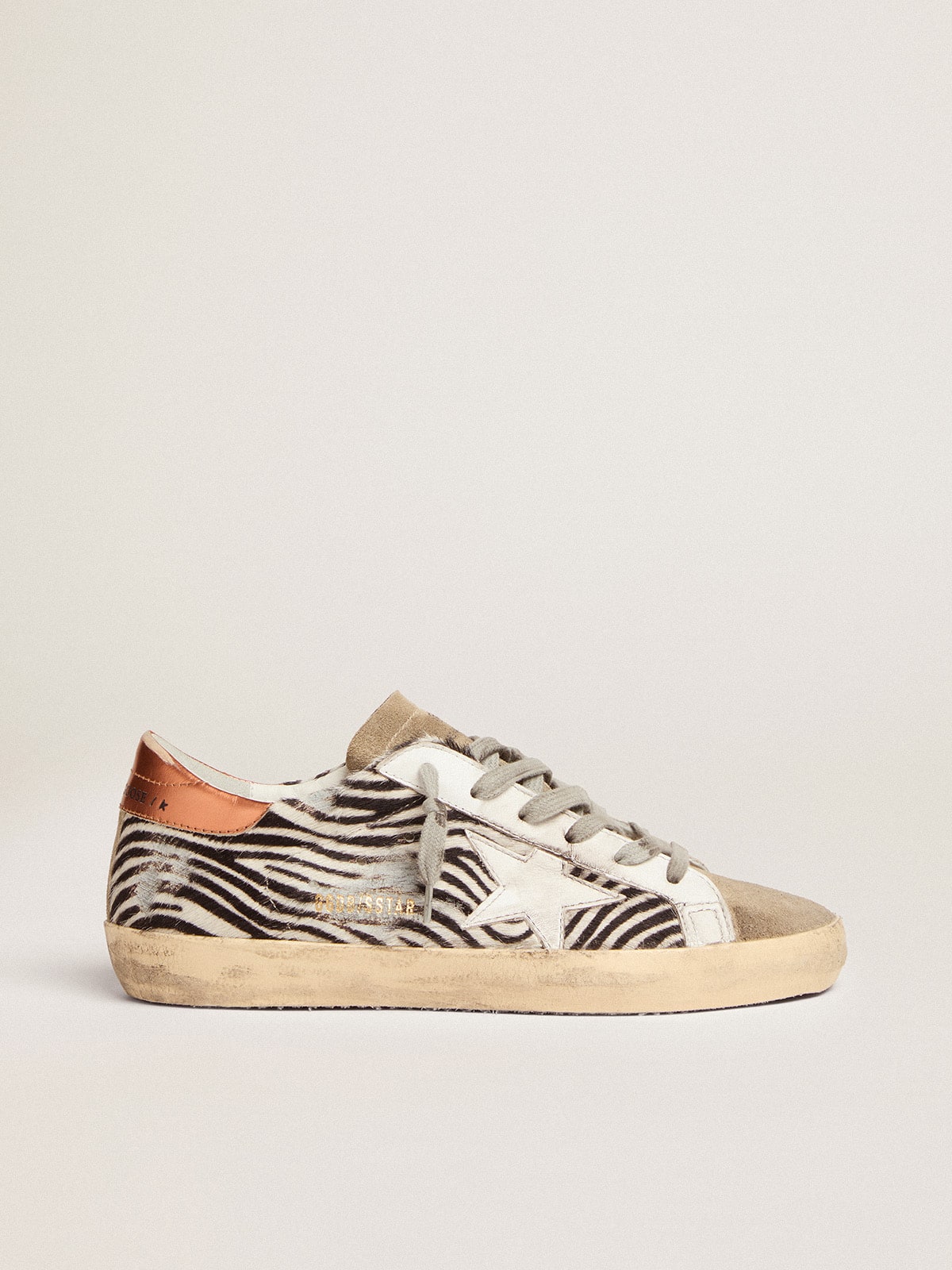 Golden Goose - Women's Super-Star LTD in zebra print pony skin with white star in 