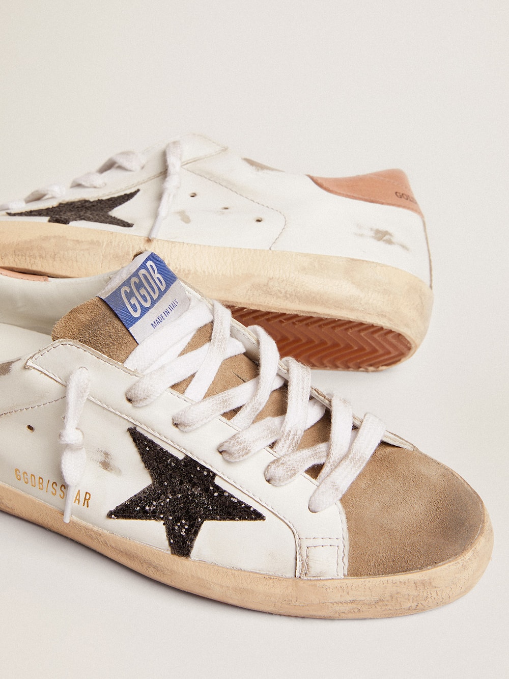 Golden Goose - Women's Super-Star with black glitter star and pink heel tab in 