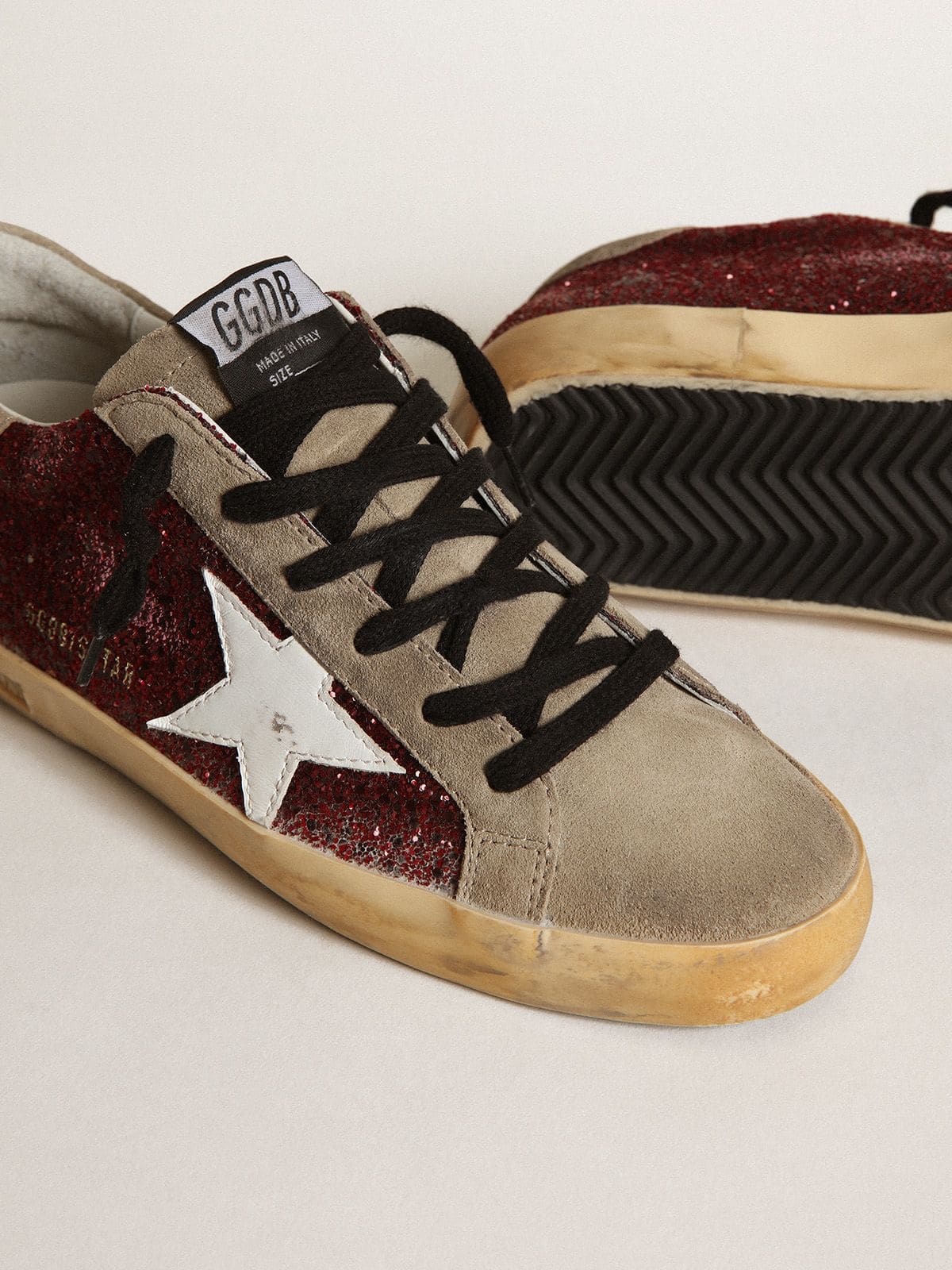 Golden Goose - Super-Star Donna in glitter bordeaux con stella in pelle bianca e linguetta in suede tortora in 