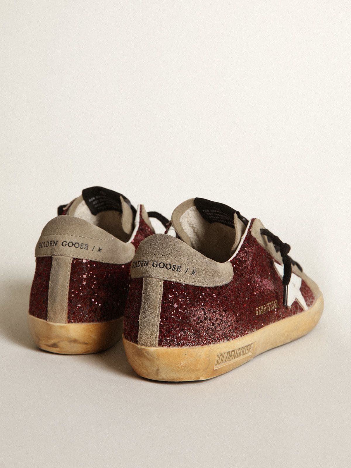 Golden Goose - Super-Star Donna in glitter bordeaux con stella in pelle bianca e linguetta in suede tortora in 