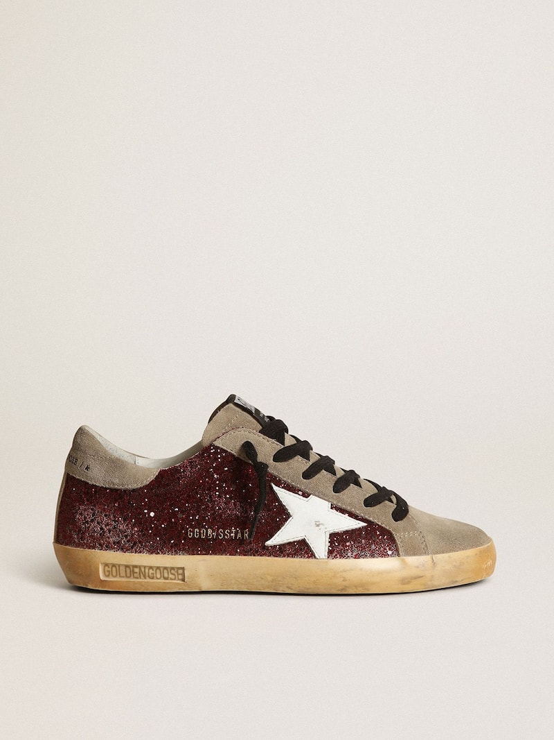 Women's Super-Star in burgundy glitter with white leather star and dove-gray suede tongue