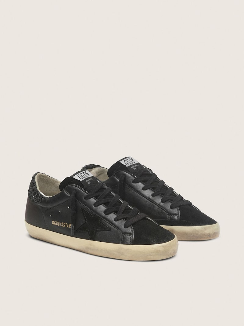 Golden Goose - Super-Star Donna in nappa nera con stella in suede nero e talloncino in glitter neri in 
