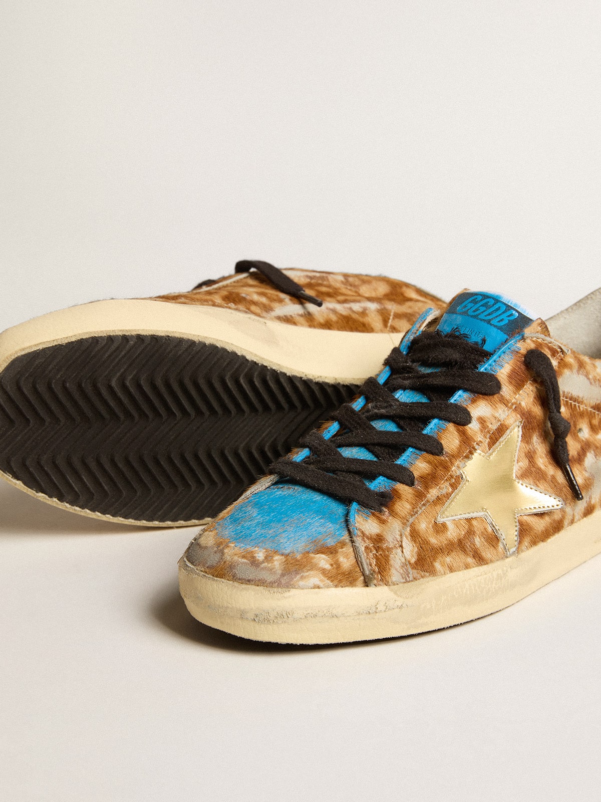 Women’s Super-Star LAB in leopard pony skin with gold star and gray heel tab