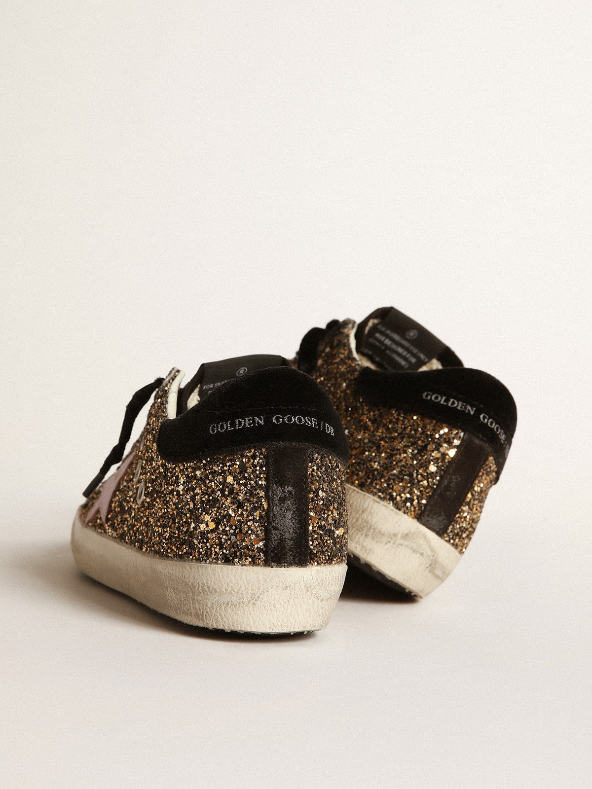 Golden Goose - Sneakers Super-Star aus Glitzer mit rosa Stern aus Leder in 