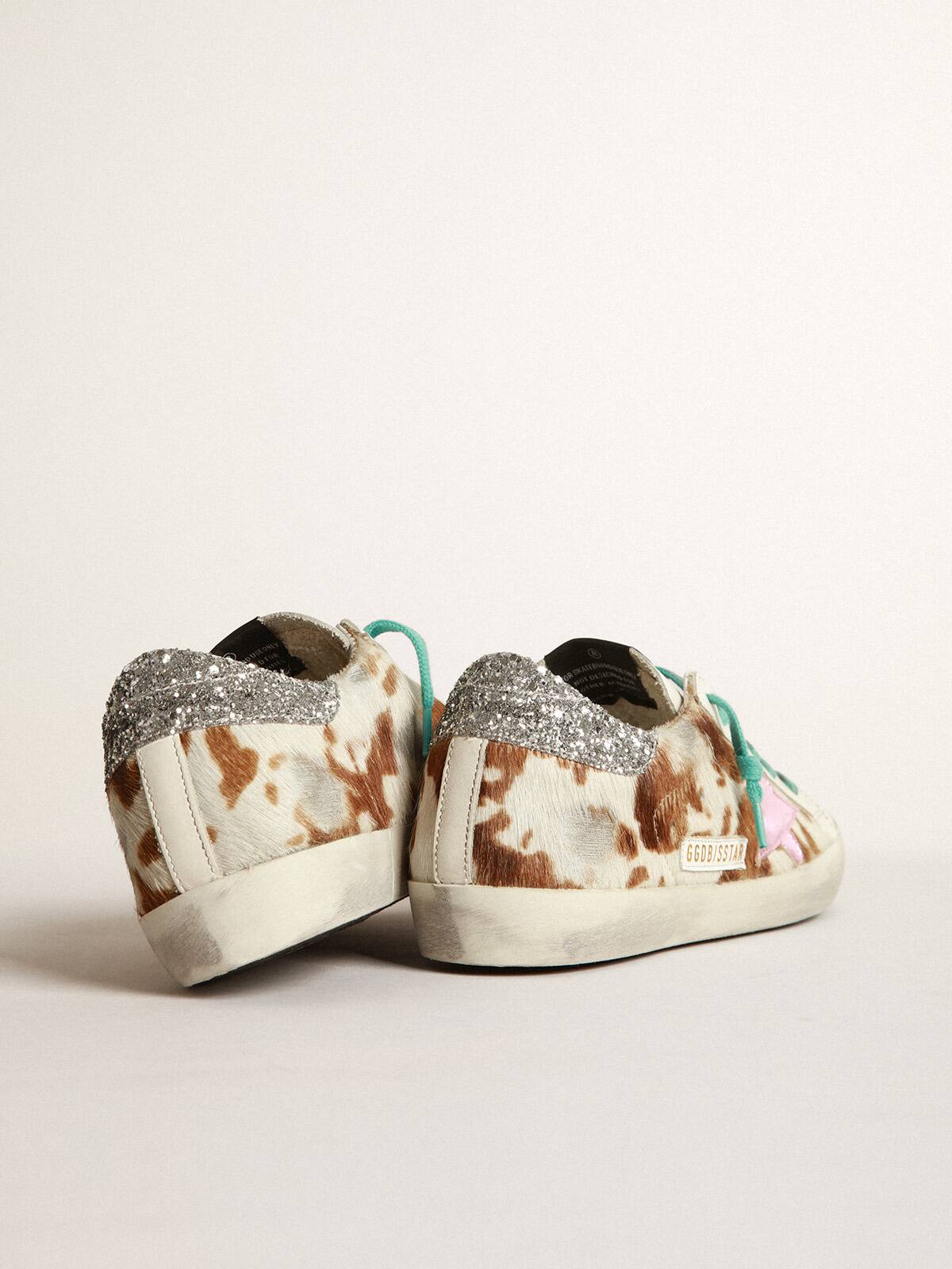 Golden Goose - Cow-print Super-Star sneakers with glittery heel tab     in 