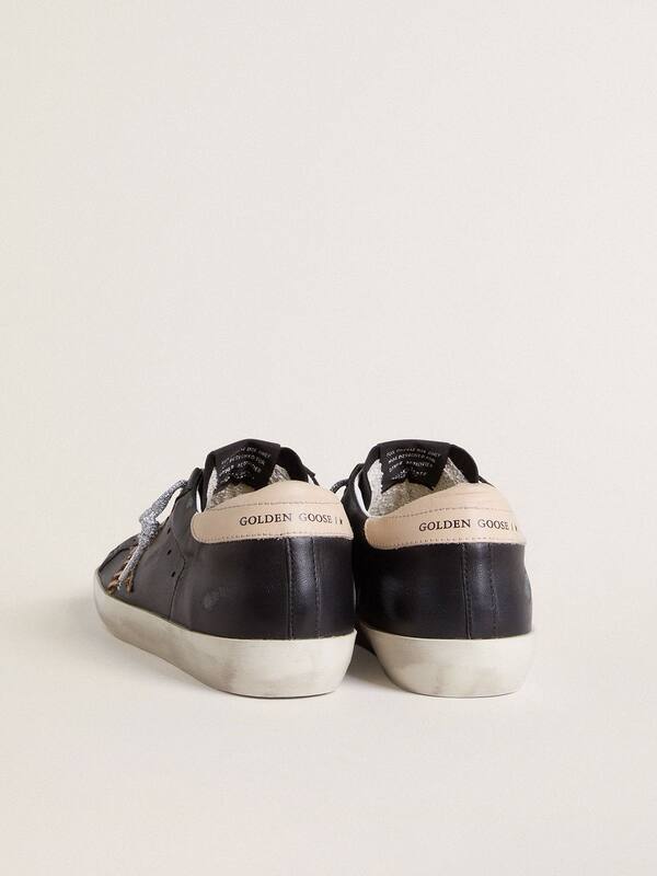 Golden Goose - Women’s Super-Star in black nappa leather with zebra-print pony skin star and beige leather heel tab in 