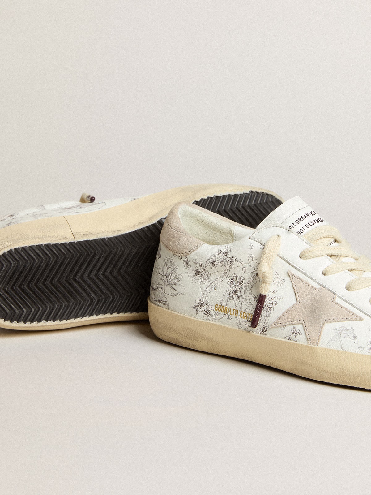 Golden Goose - Women’s Super-Star LTD CNY in white leather with lettering on the upper in 