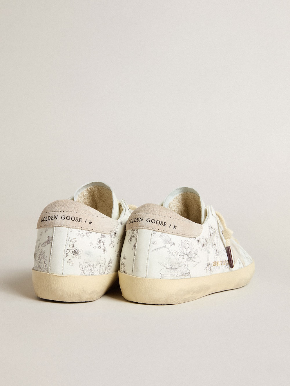Golden Goose - Women’s Super-Star LTD CNY in white leather with lettering on the upper in 