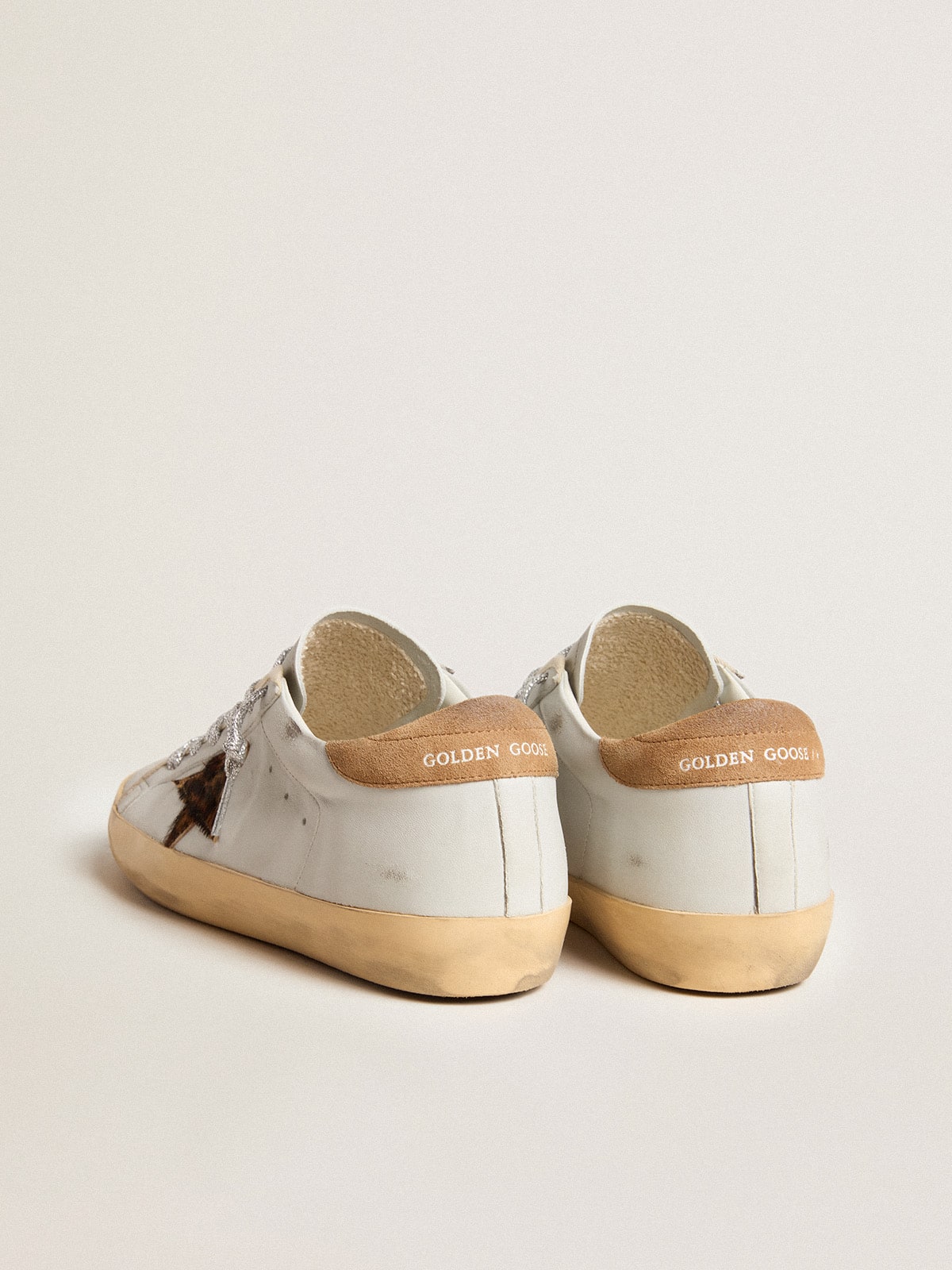 Women s Super Star in nappa leather with pony skin star and suede heel tab Golden Goose