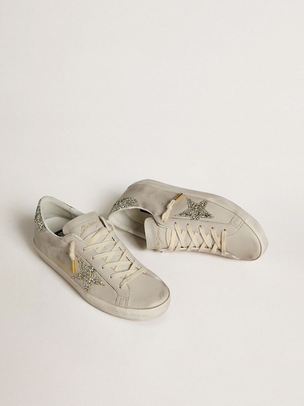 Golden Goose - Women's Super-Star LTD in ivory nappa leather with platinum glitter star and heel tab in 