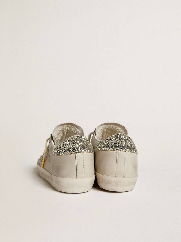 Golden Goose - Women's Super-Star LTD in ivory nappa leather with platinum glitter star and heel tab in 