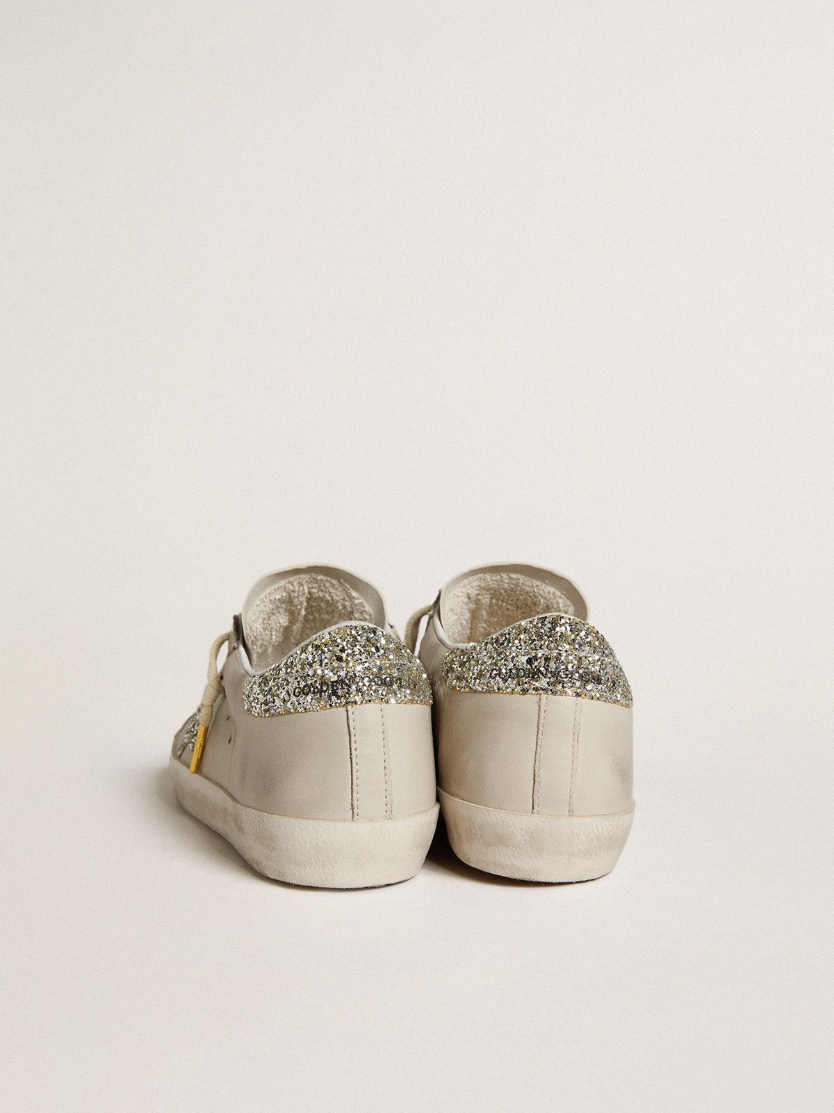 Golden Goose - Women's Super-Star LTD in ivory nappa leather with platinum glitter star and heel tab in