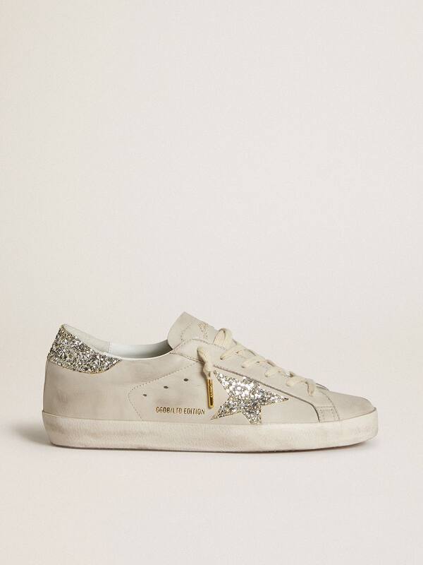 Golden Goose - Women's Super-Star LTD in ivory nappa leather with platinum glitter star and heel tab in 