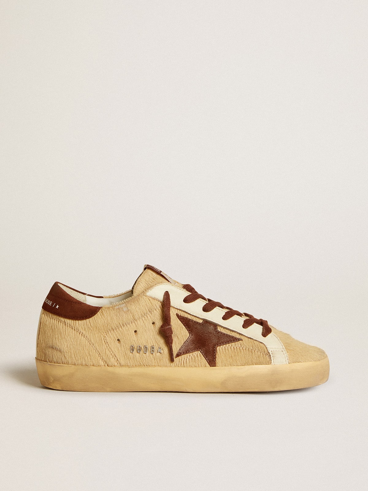 Women s Super Star in beige pony skin with brown suede star and heel tab Golden Goose