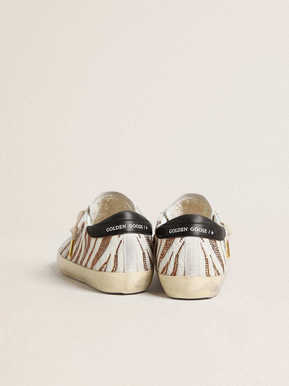 Golden Goose - Super-Star LTD de mujer de piel efecto potro blanca con purpurina marrón y estrella de ante blanca in 