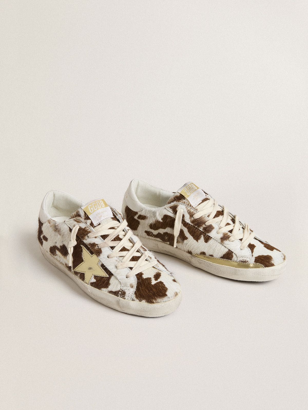 Golden Goose - Super-Star レディース アニマル柄ポニースキン ラミネートレザースター（ゴールド）  in 