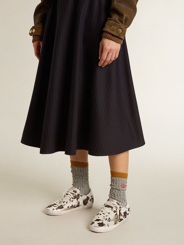 Golden Goose - Women’s Super-Star in animal-print pony skin with gold metallic leather star  in 