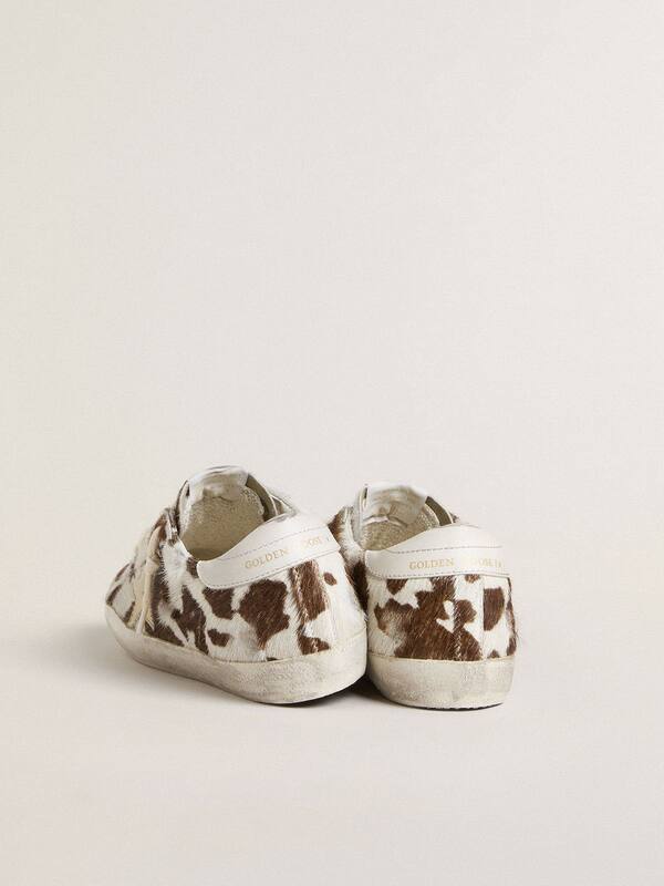 Golden Goose - Women’s Super-Star in animal-print pony skin with gold metallic leather star  in 