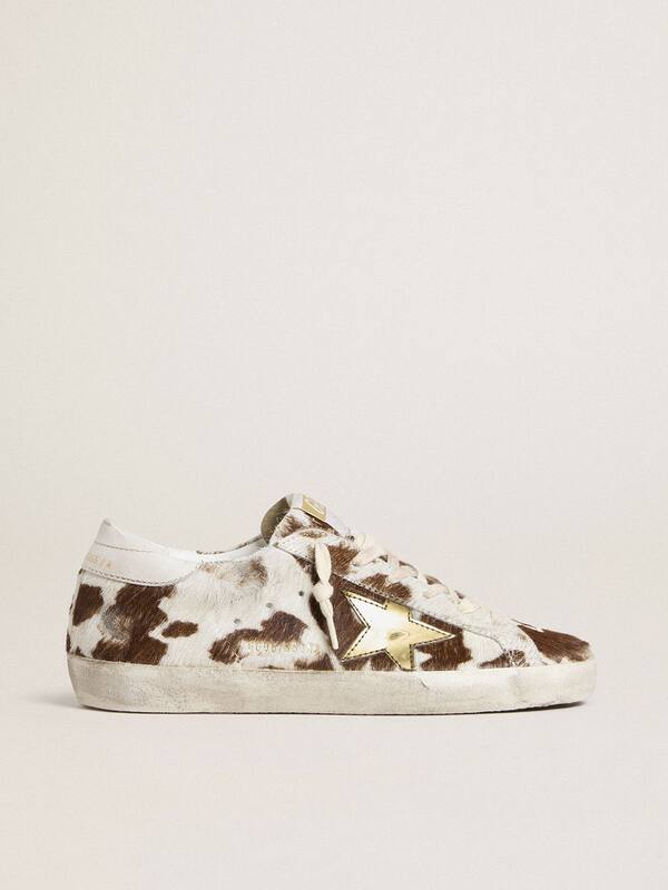 Golden Goose - Women’s Super-Star in animal-print pony skin with gold metallic leather star  in 