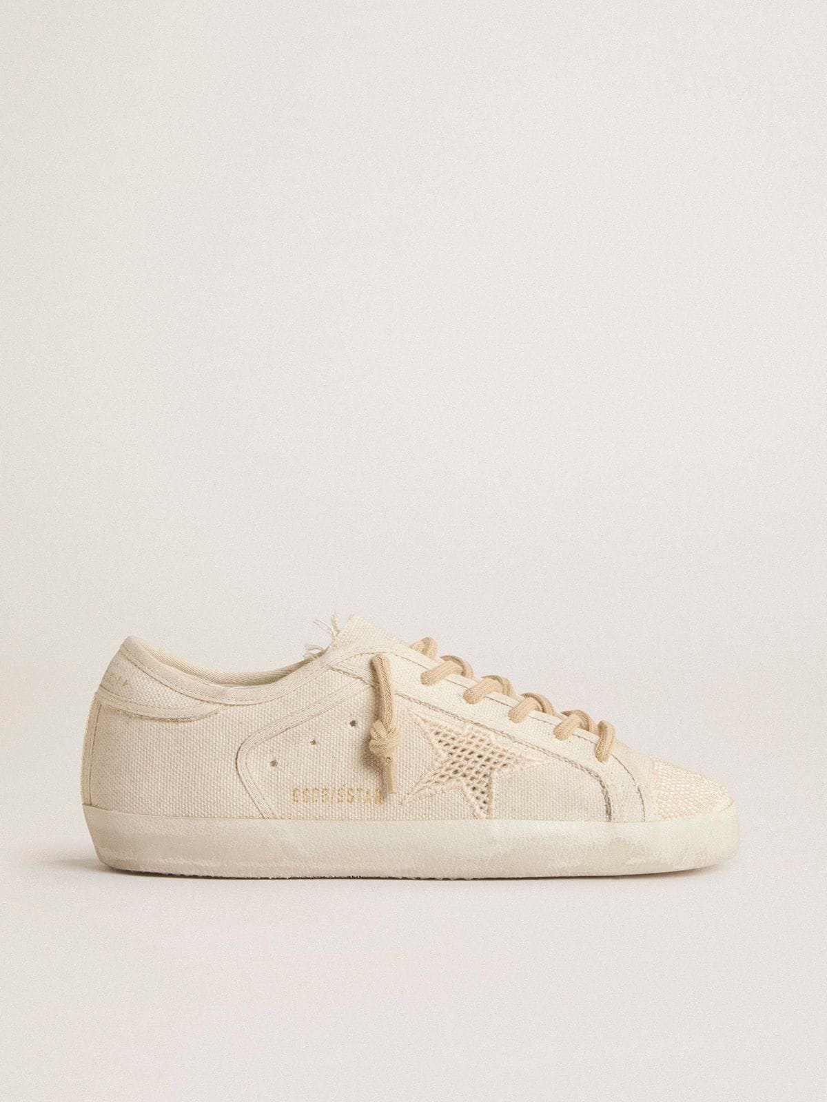 Golden Goose - Super-Star en toile blanc perlé avec étoile effet résille ton sur ton in 