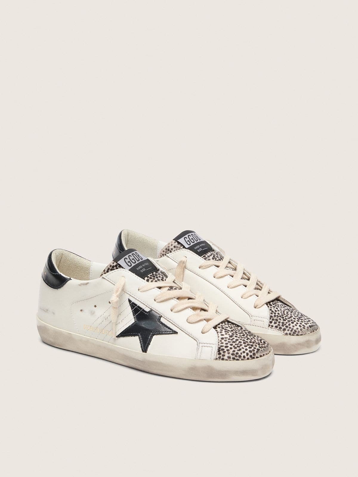 Super-Star LTD femme en cuir blanc avec &eacute;toile noire et d&eacute;tails en cuir fa&ccedil;on poulain