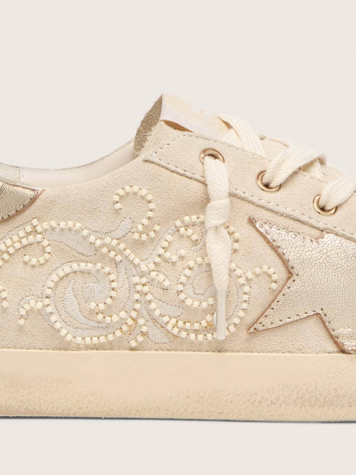 women-s-super-star-ltd-in-pearl-suede-with-gold-star-and-bead-embroidery