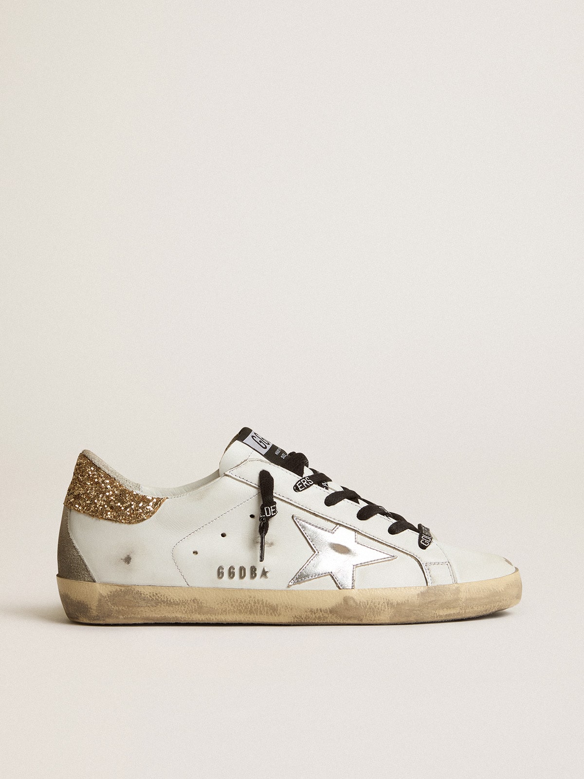 Golden Goose - Zapatillas deportivas Super-Star blancas de piel con refuerzo del talón de purpurina in 