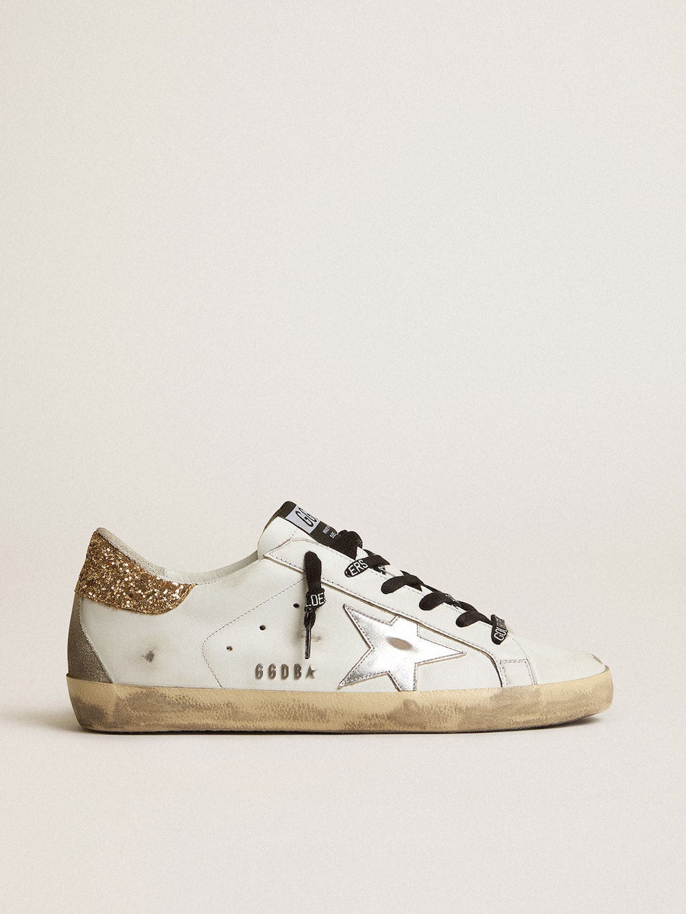 Golden Goose - Sneakers Super-Star Donna bianche in pelle con talloncino glitter in 