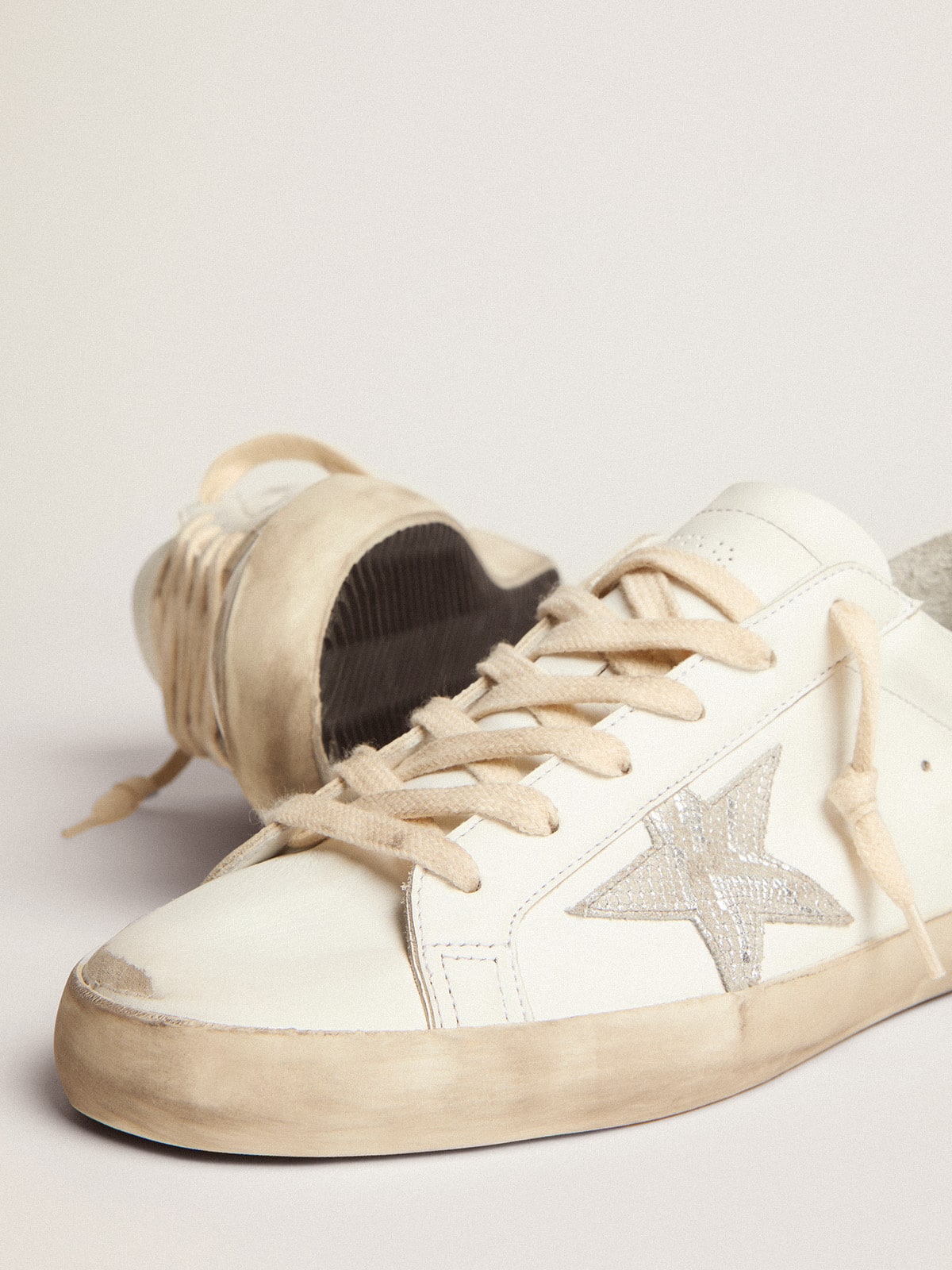 Golden Goose - Super-Star feminino com estrela de couro prateado e estampa de píton in 