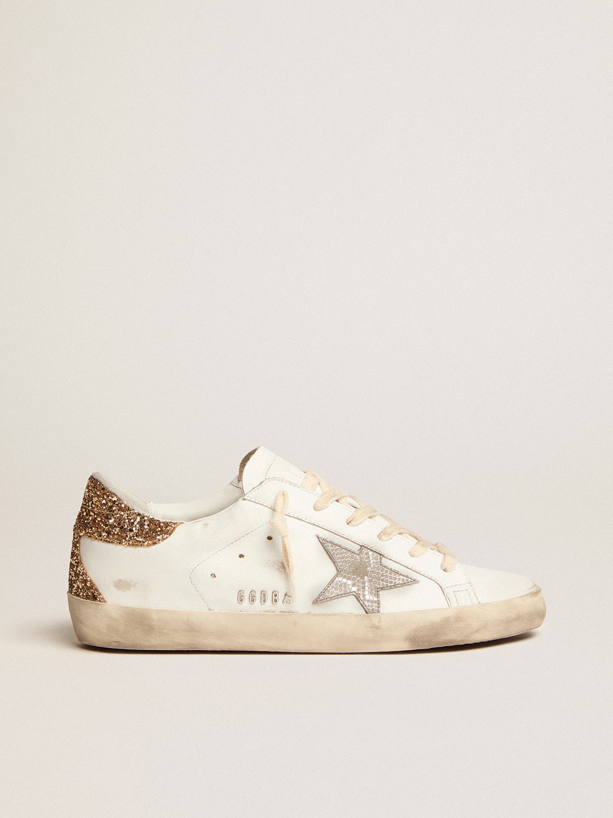 Golden Goose - Super-Star feminino com estrela de couro prateado e estampa de píton in 