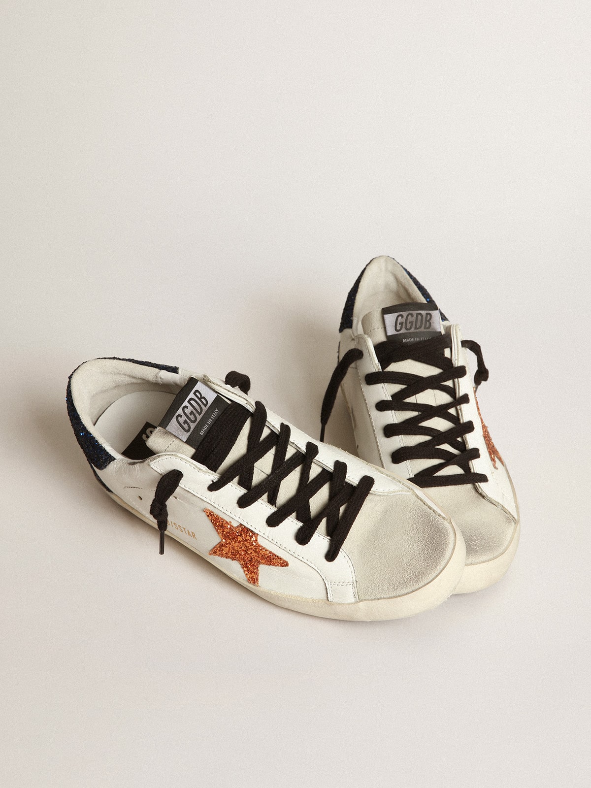 Golden Goose - Super-Star sneakers with peach-pink glitter star and blue glitter heel tab in 