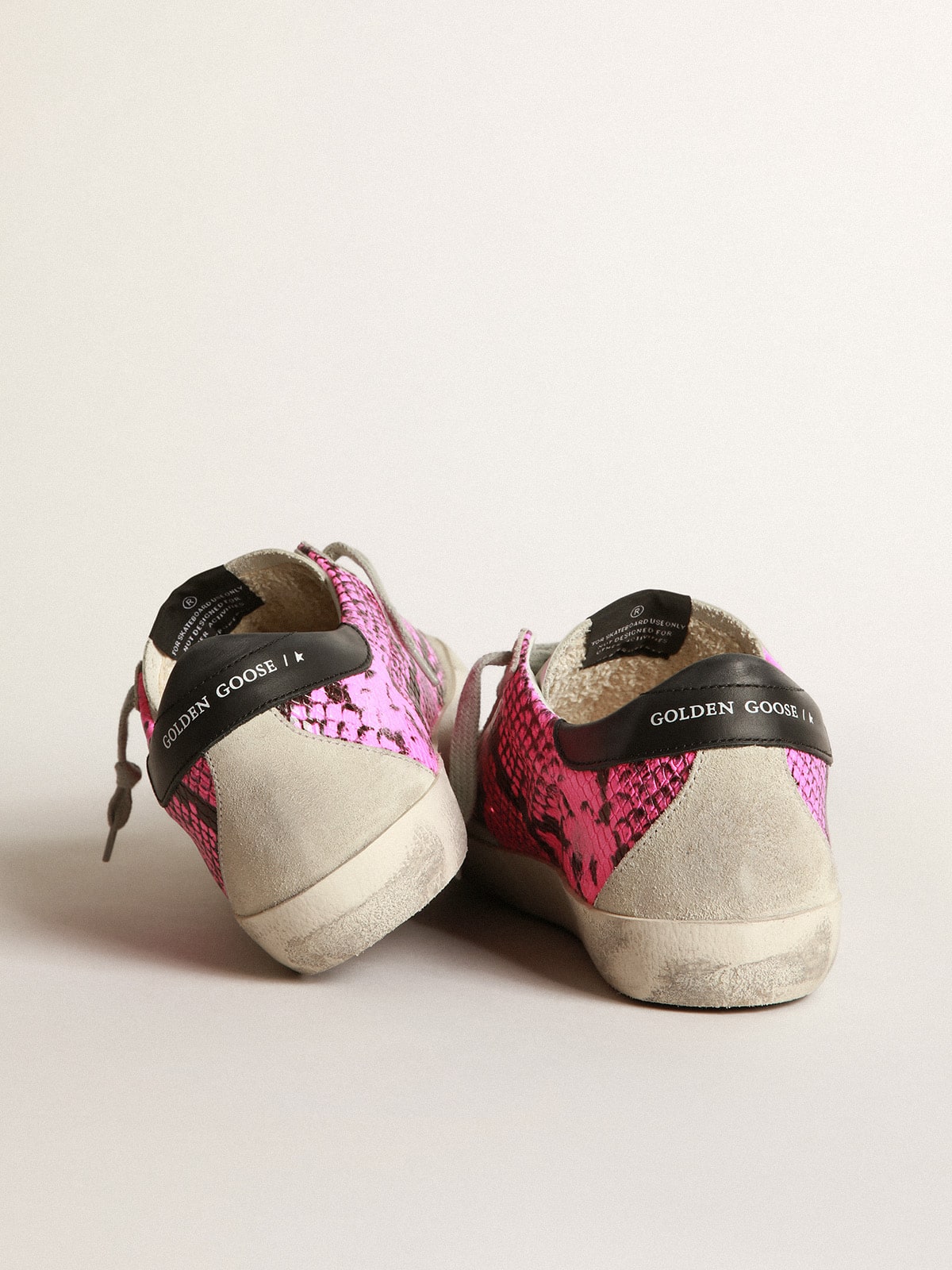 Golden Goose - Sneakers Super-Star fuchsia en cuir à imprimé python in 