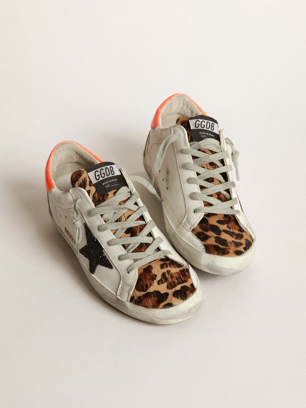 Golden Goose - Super-Star sneakers with leopard-print insert, glittery star and orange heel tab in 