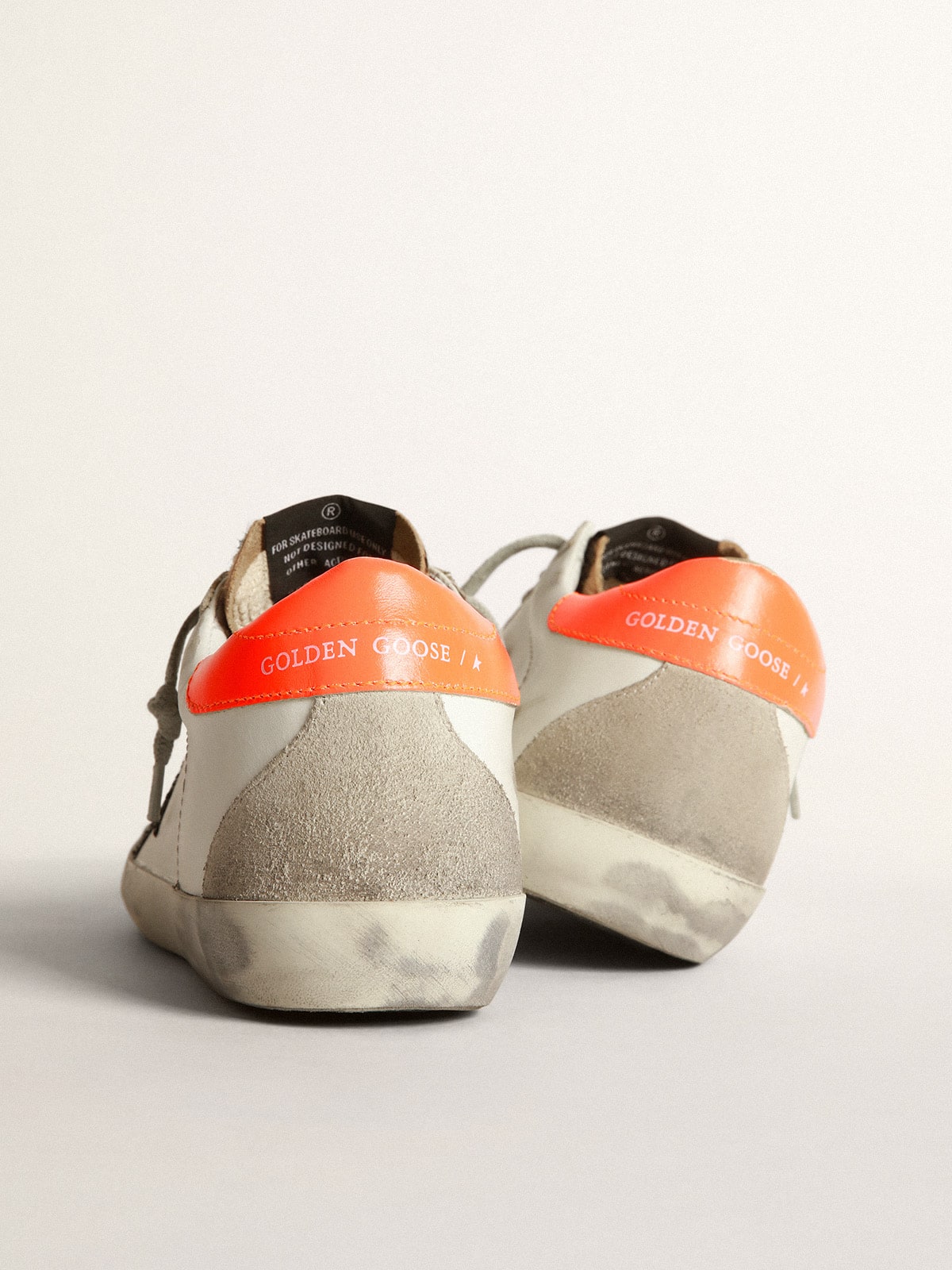 Golden Goose - Super-Star sneakers with leopard-print insert, glittery star and orange heel tab in 