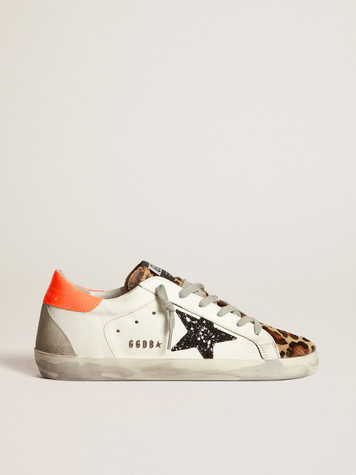 Golden Goose - Super-Star sneakers with leopard-print insert, glittery star and orange heel tab in 