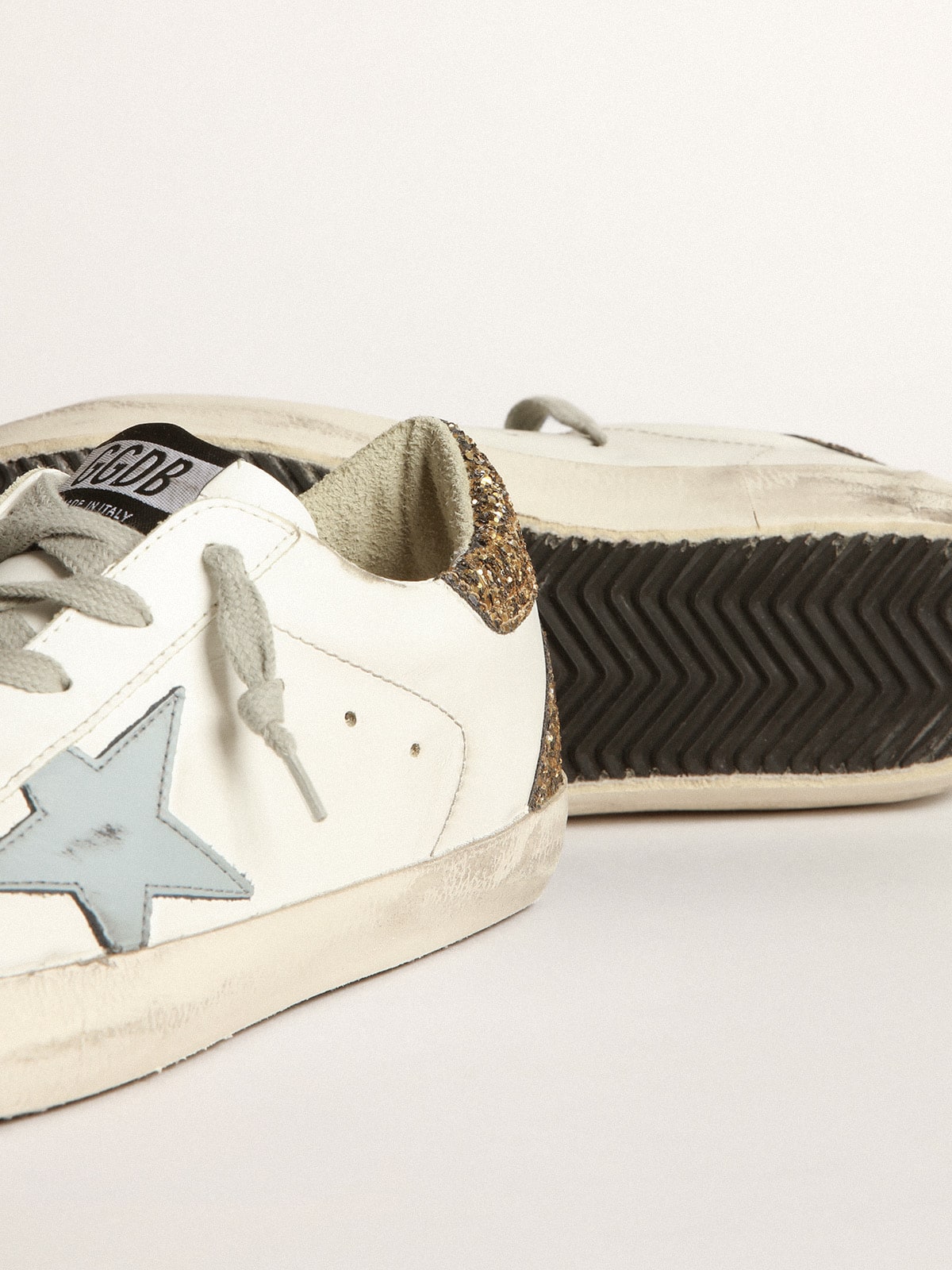Super-Star sneakers with light blue leather star and gold glitter  crocodile-print heel tab