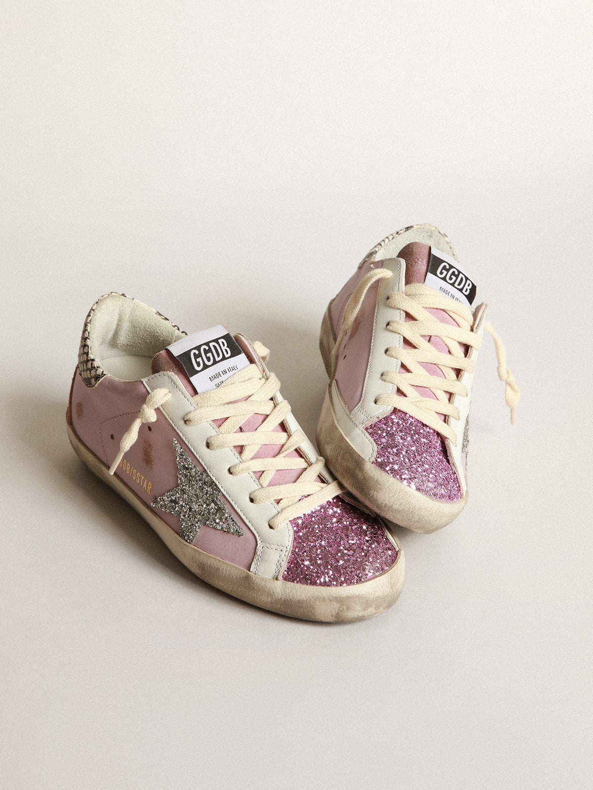 Golden Goose - Zapatillas deportivas Super-Star de piel rosa con estrella con purpurina plateada y refuerzo del talón de piel con estampado pitón in 