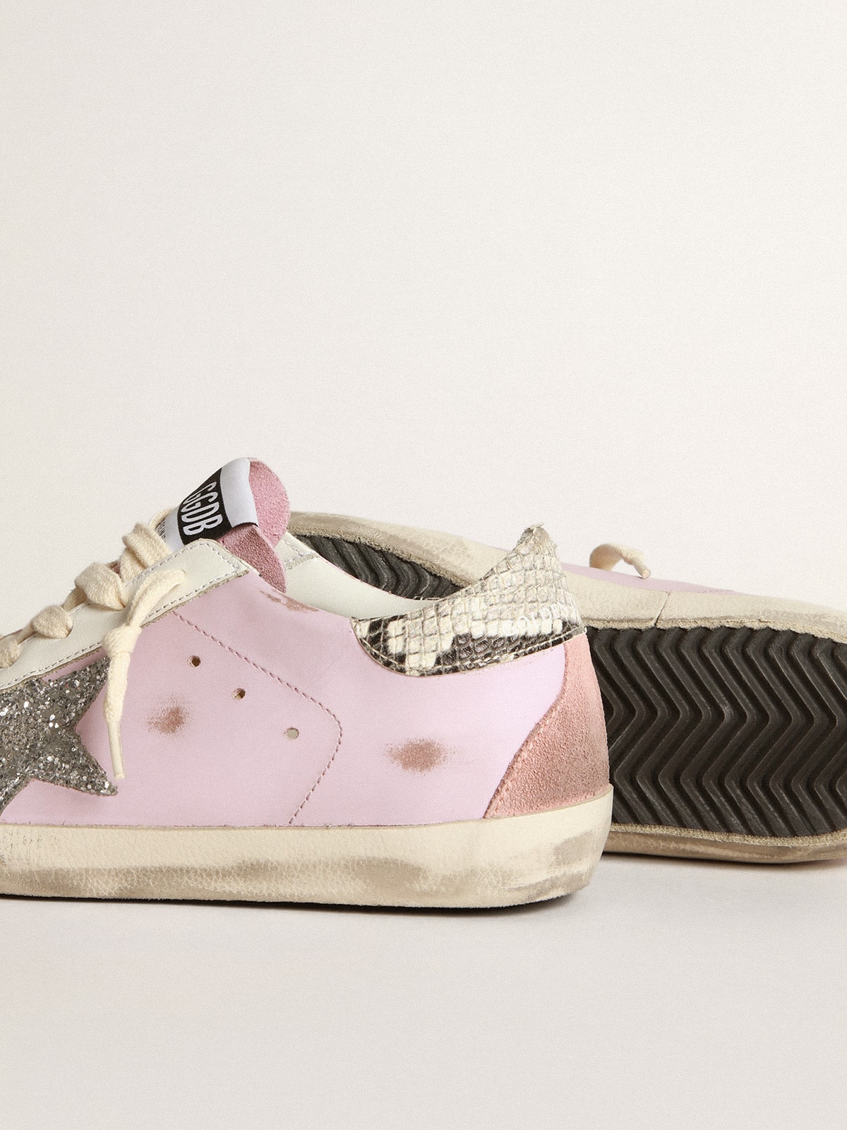 Golden Goose - Zapatillas deportivas Super-Star de piel rosa con estrella con purpurina plateada y refuerzo del talón de piel con estampado pitón in 