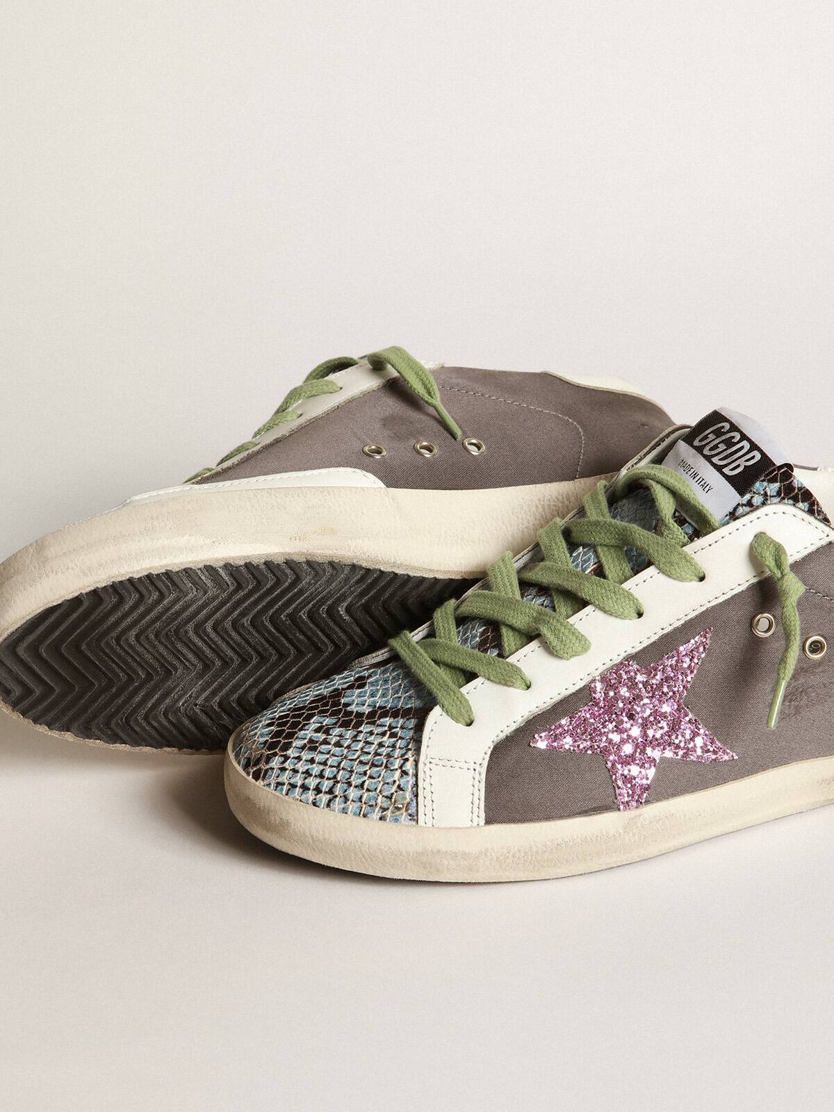 Golden Goose - Grey and python-print Superstar sneakers with glittery star in 