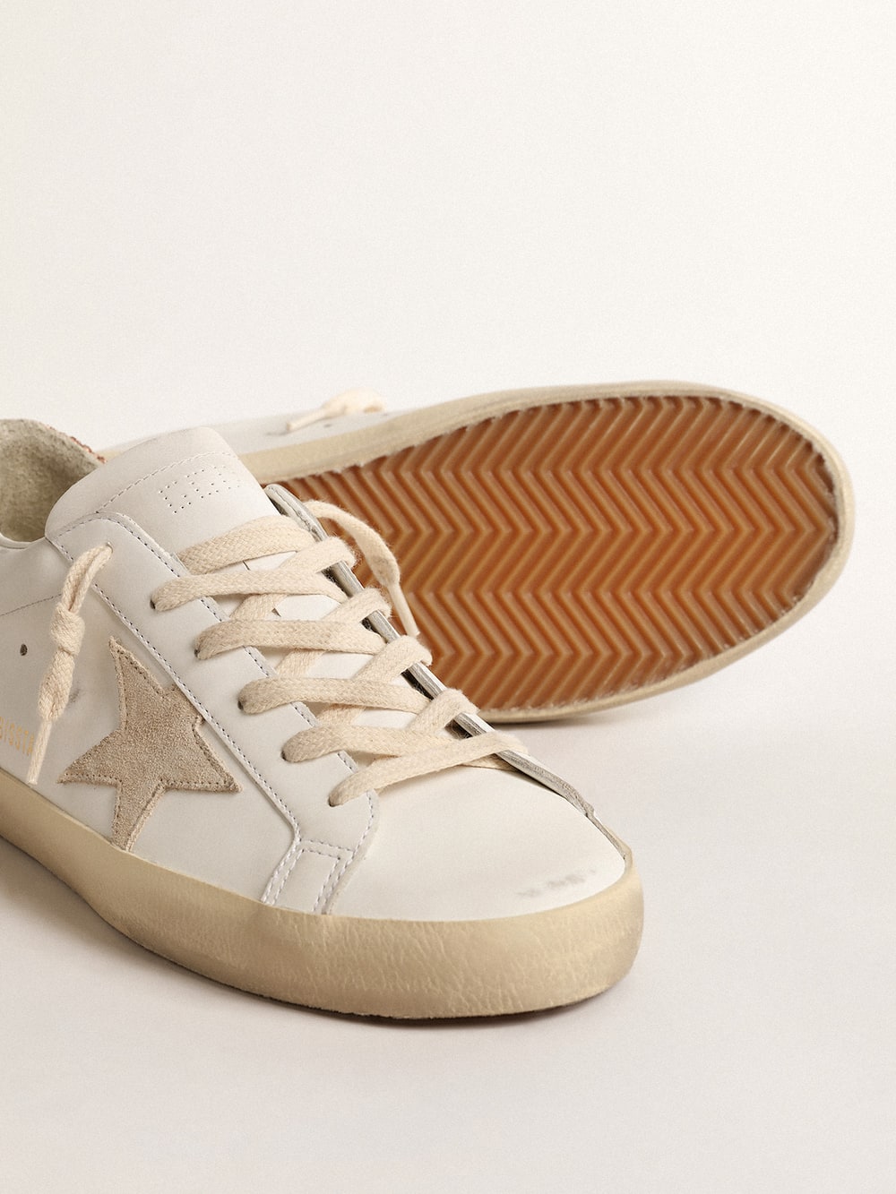 Golden Goose - Women's Super-Star with a suede star and peach-pink glitter heel tab in 