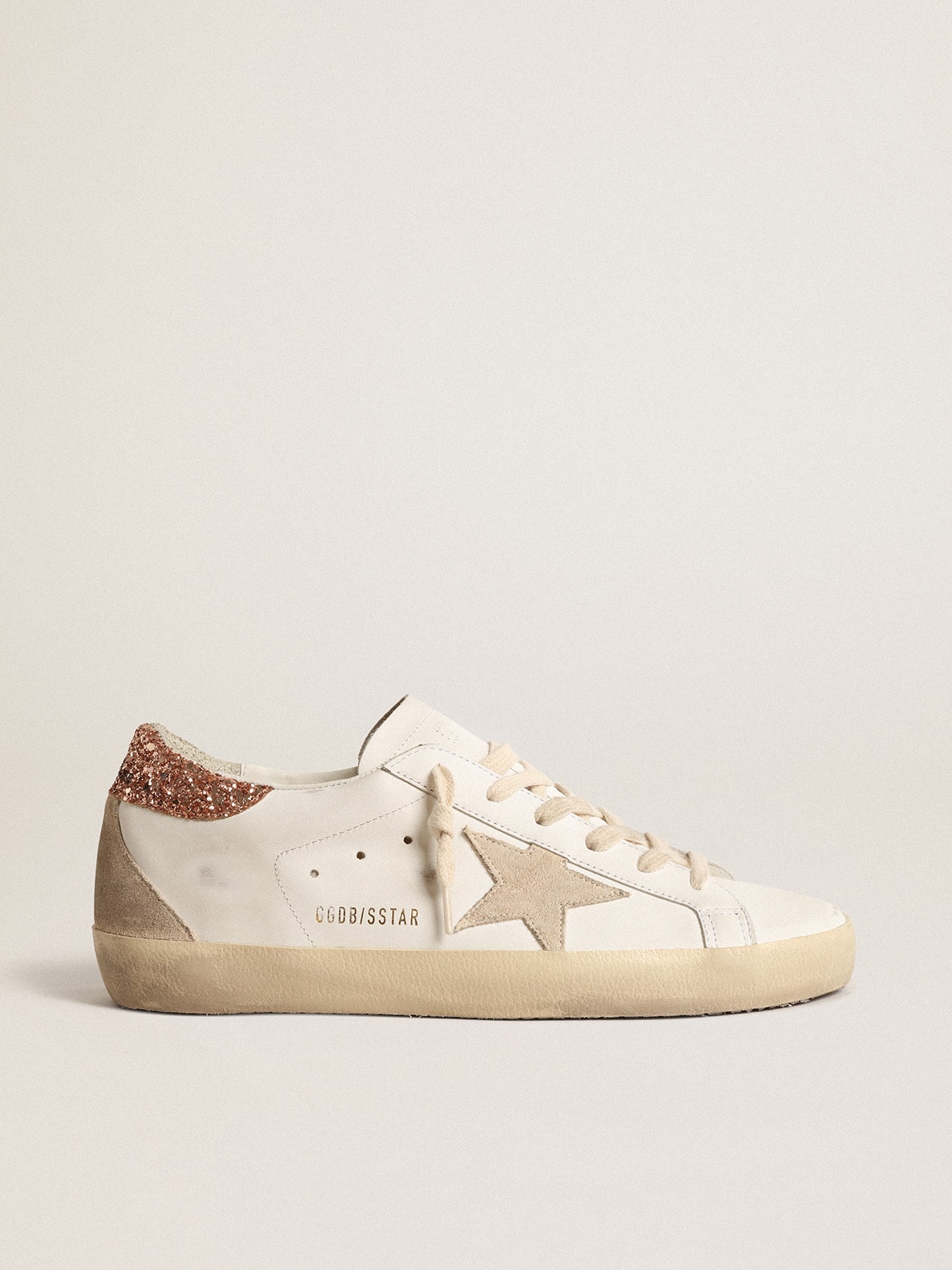 Women's Super-Star with a suede star and peach-pink glitter heel tab | Golden Goose