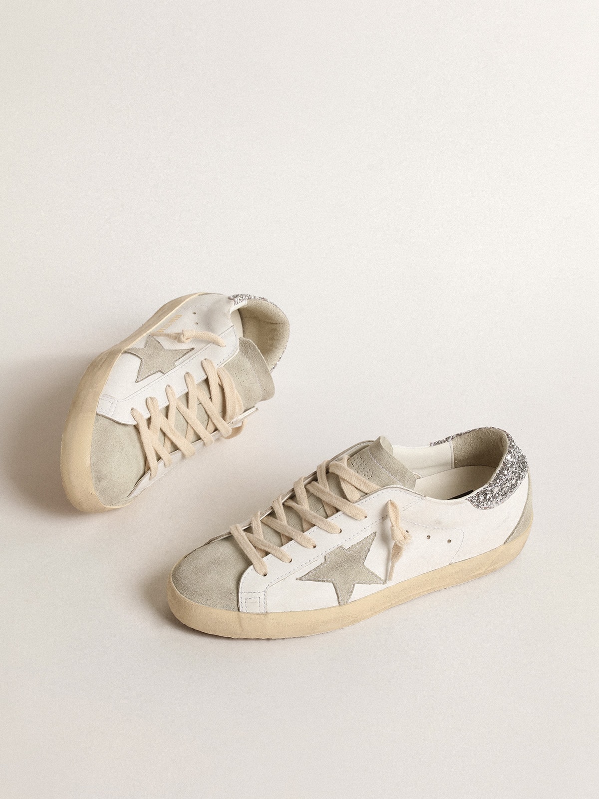 Golden Goose - Women's Super-Star with gray star and silver glitter heel tab in 