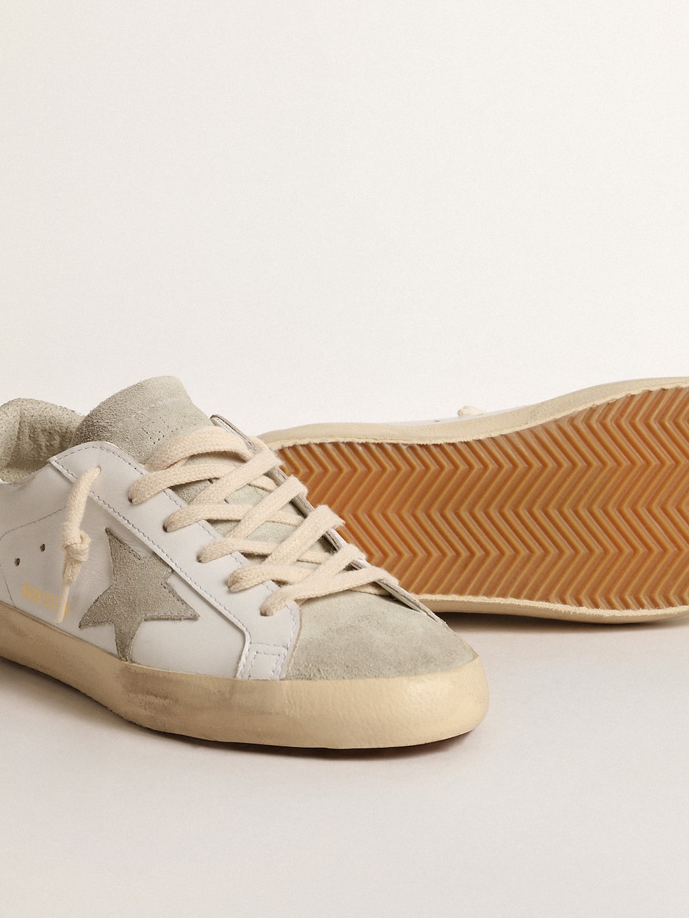 Golden Goose - Women's Super-Star with gray star and silver glitter heel tab in 