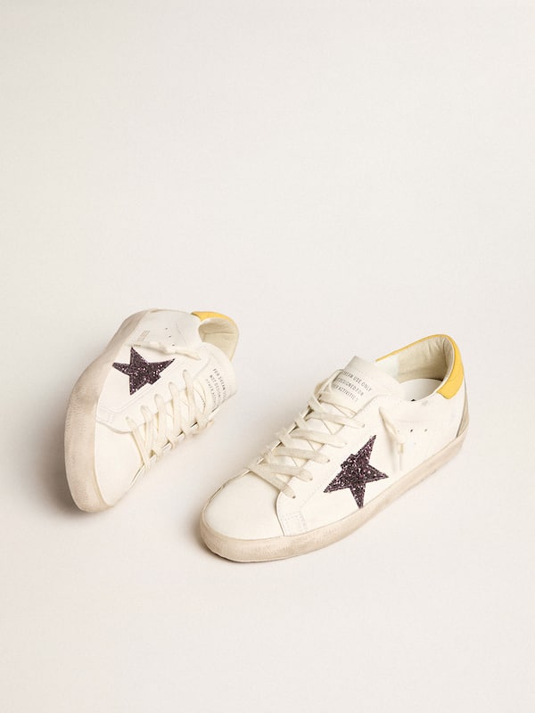 Golden Goose - Women’s Bio-based Super-Star with red glitter star and leather heel tab in 