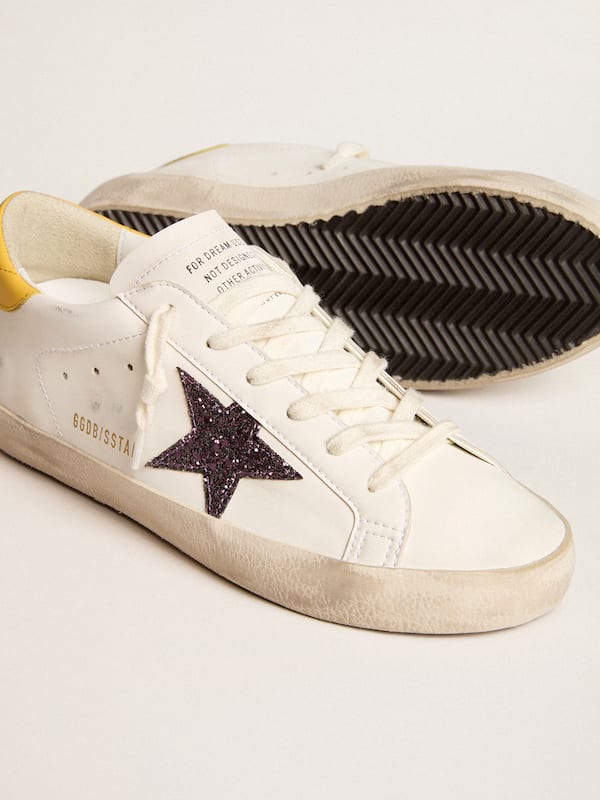 Golden Goose - Women’s Bio-based Super-Star with red glitter star and leather heel tab in 