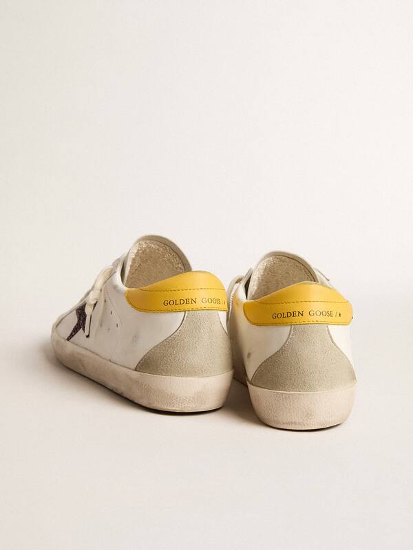 Golden Goose - Women’s Bio-based Super-Star with red glitter star and leather heel tab in 