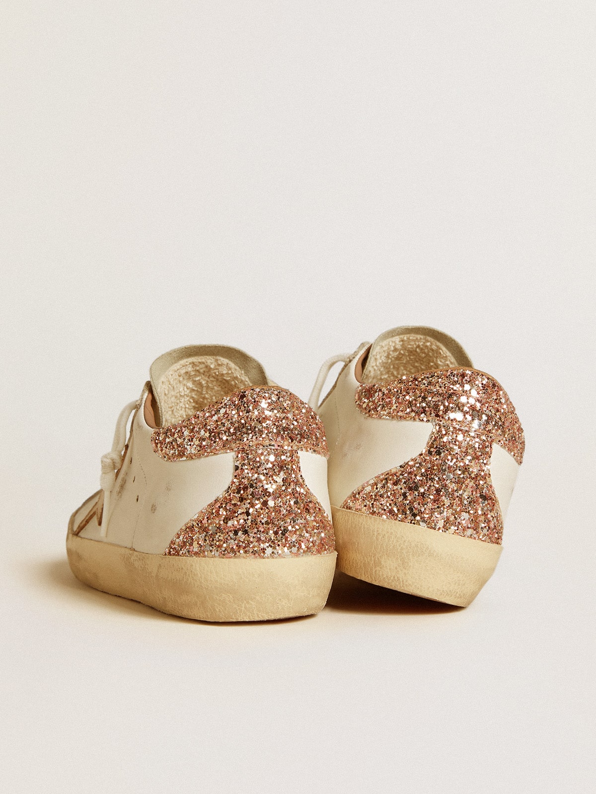 Golden Goose - Women's Super-Star with nude leather star and gold glitter heel tab in 