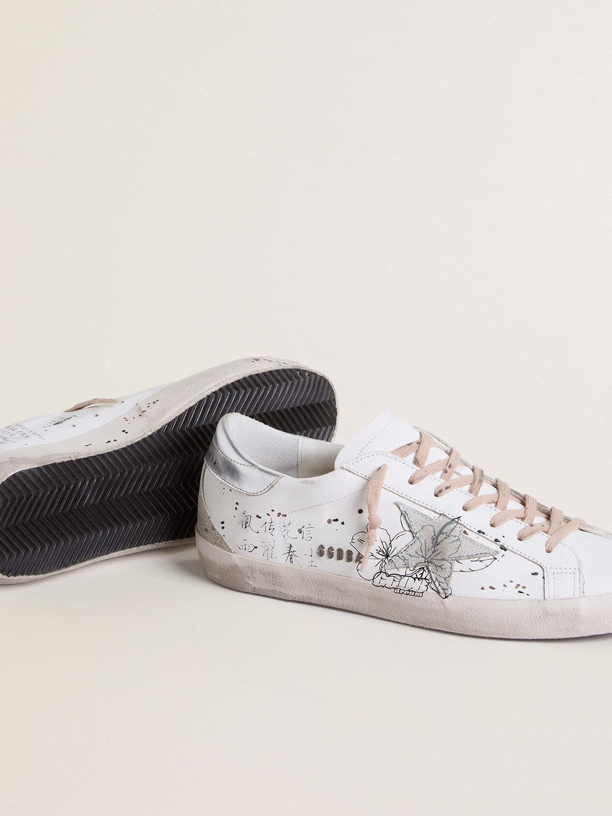 Golden Goose - Women’s Super-Star LTD with ice-gray suede star and black designs in 