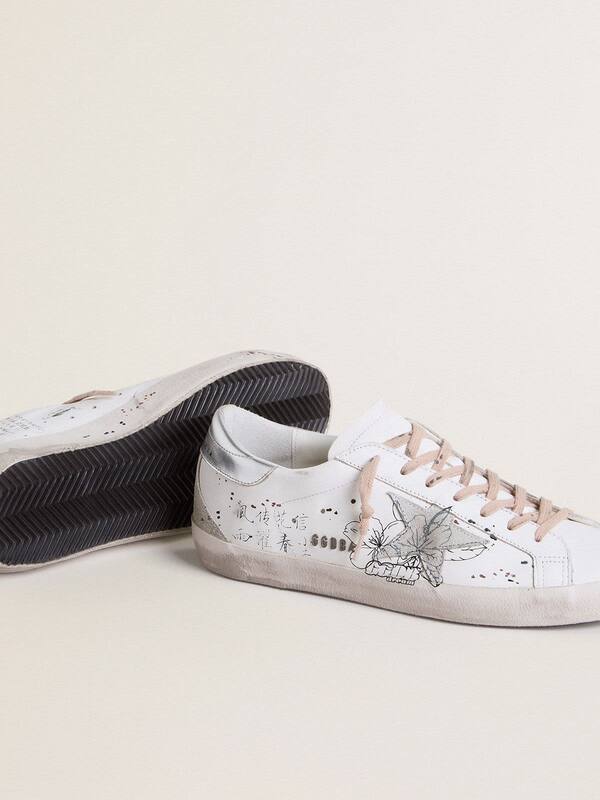 Golden Goose - Women’s Super-Star LTD with ice-gray suede star and black designs in 