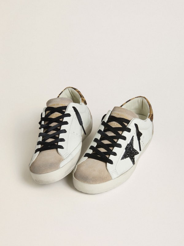 Golden Goose - Women's Super-Star with black glitter star and leopard-print pony skin heel tab in 